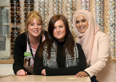 Emma Ward with Asda Hyde opticians Mubeem and Becky