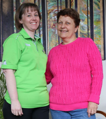 Asda Falmouth colleague Lisa Kirkpatrick with food bank volunteer Ruth Painter