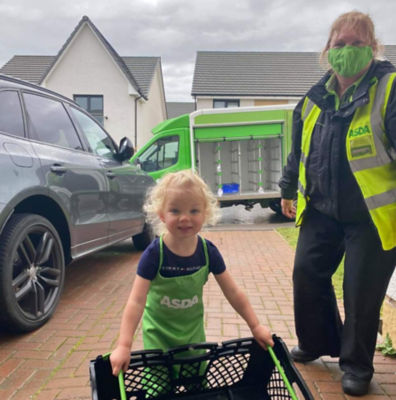 Ada Higgins helps Wendy McNairn from Asda Elgin