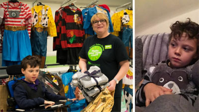 Kath from Asda Llandudno gives Alfie his new pyjamas
