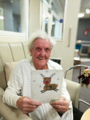 92-year-old care home resident Doris with her handmade Asda Christmas card