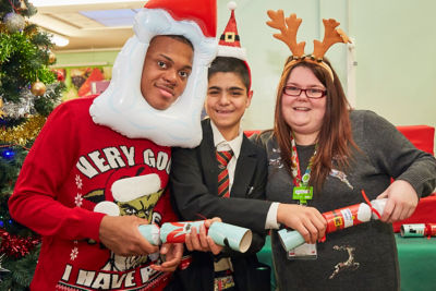 Asda Dagenham community champion Gemma Gray with students from Barking Abbey School