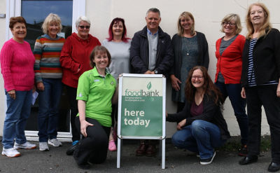 Asda Falmouth community champion with volunteers at Penryn and Falmouth food bank