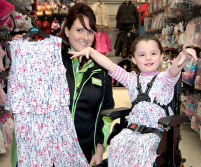 Alexa receives her new jumpsuit from Lisa at Asda Hessle 