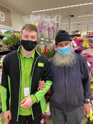 Kieran O'Rourke from Asda Strelley and blind customer Michael Fuller
