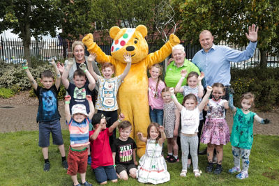 Elaine Livingstone from Asda Portadown joined Pudsey bear to visit the Sticky Fingers youth programme in Newry