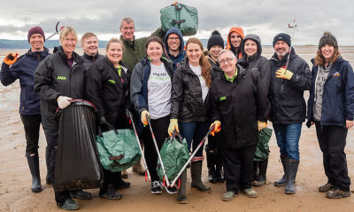Asda colleagues help clean up West Kirby beach