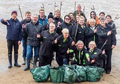 Asda colleagues help to clean West Kirby beach