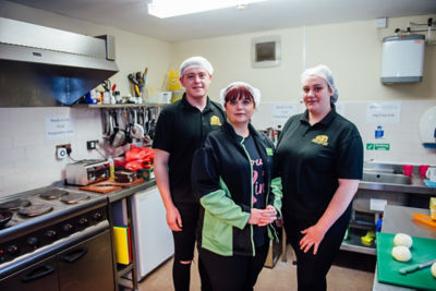 Asda Blackwood community champion Lucie helps to prepare meals for Storm Dennis flood victims