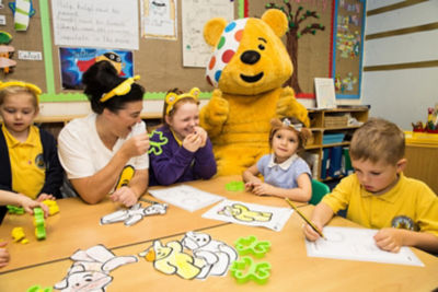 Caroline Canty from Asda Patchway celebrates BBC Children in Need with Wheatfields Primary School