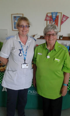 Brenda Wright from Asda Bedminster with staff nurse Jane Morley