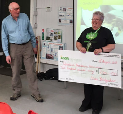 Bridgwater community champion Jo presenting a cheque