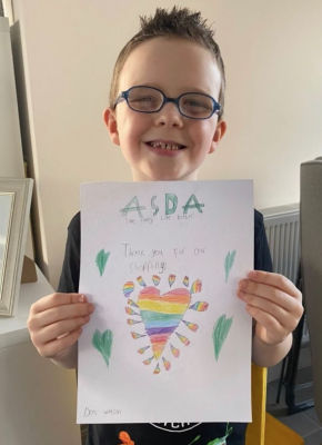 Ben Watson with his poster from Asda Antrim