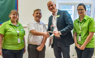 Asda colleagues presented Matthew with his prize