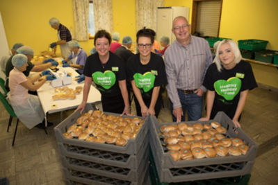 Asda Bolton area colleagues with Urban Outreach founder Dave Bagley