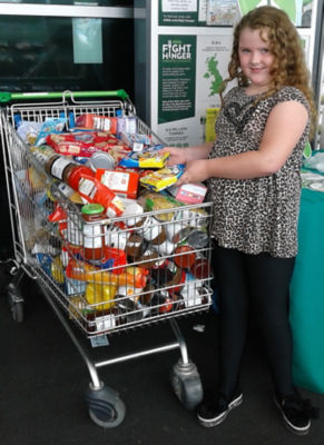 An Asda Bootle customer donating to a local foodbank