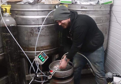 Drew at work in the brewery