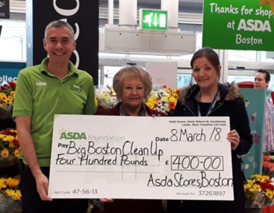 Asda Boston community champion Stephen Bromby hands over the £400 grant to big Boston clean up