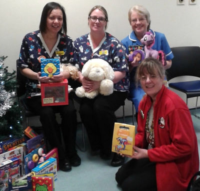 Asda Chatham community champion Leonie donating toys to Medway Hospital