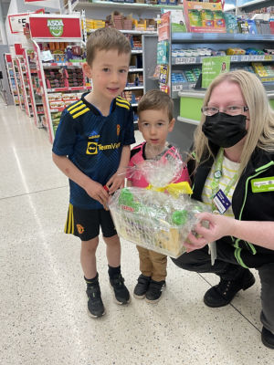 Ciaran Hay with Ann-Marie Davidson at Asda Dunbar