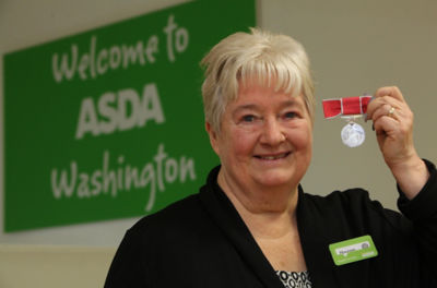 Asda colleague Maureen Wallwork with her British Empire Medal