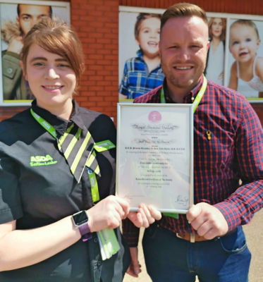 Corby security colleague receives Royal Humane Society award for saving man's life