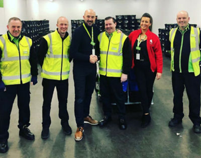 Asda Cumbernauld delivery driver Brian Chisholm raised the alarm when he saw a customer had collapsed