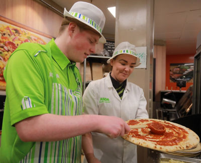 Tor Bank School pupil Conor McSherry makes a pizza during a placement at Asda Dundonald