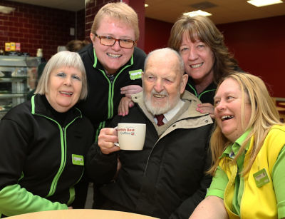 Blind customers Trevor enjoying a cuppa with colleagues at Asda Dunstable