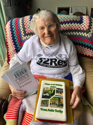 Asda Derby help customer Eunice Dring celebrate her 100th birthday