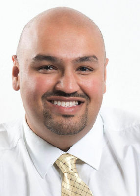 Asda superintendent pharmacist Faisal Tuddy
