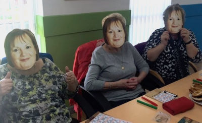 Asda Tonypandy community champion Karen Thomas with local people at Canolfan Pentre