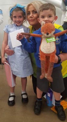 Wendy Cummings from Asda Felling returns Foxy to Patrick and Caite