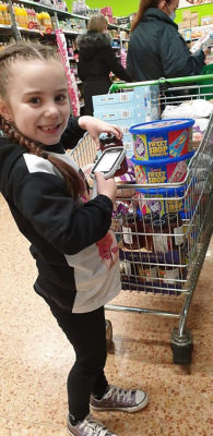Asda Middlesbrough supports Esmae Morgan who raised more than £1,000 to help people in need this Christmas
