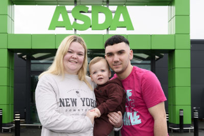 Beth Williams and Jack Allan with baby Finlay whose life was saved by Dean Carpenter and James Jenkins at Asda Edinburgh