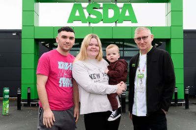 Beth Williams and Jack Allan with baby Finlay who was saved by Asda Edinburgh first aiders Dean Carpenter and James Jenkins when he stopped breathing