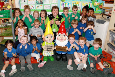 Asda Shirley community champion Sandra Grice with children from Tidbury Green Private Nursery