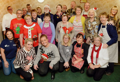 Vinnie's Cafe volunteers and Asda Gosforth community champion Michelle Castledine