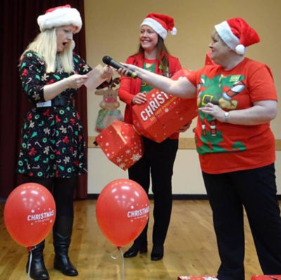 Asda Gosforth colleagues presenting the surprise cheque last Christmas