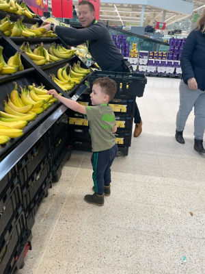 Three-year-old Harry Blagg loves helping at Asda Handsworth in Sheffield