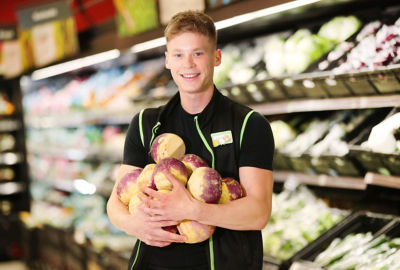 Asda colleague with swedes