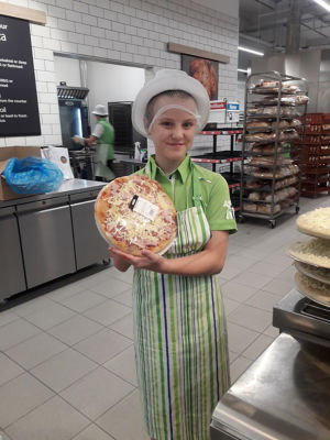 Melissa Taylor-Grounsell with the pizza she made on her day helping at Asda Isle of Wight