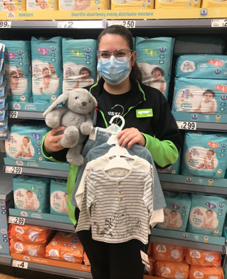 Kate Jones from Asda Pwllheli whose nephew Harry was born in the Asda car park