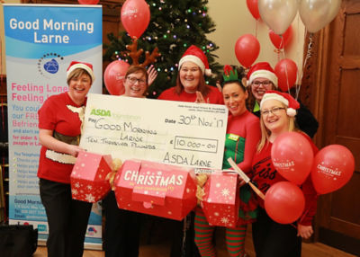 Asda Larne Christmas cheque for Good Morning Larne