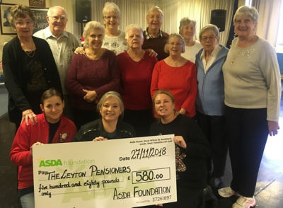 Asda Leyton Mills community champion Tracie with the group