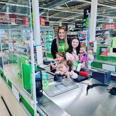 Triplets Mia, Millie and Molly-mae Moonan-Shirajudin love shopping at Asda Llandudno