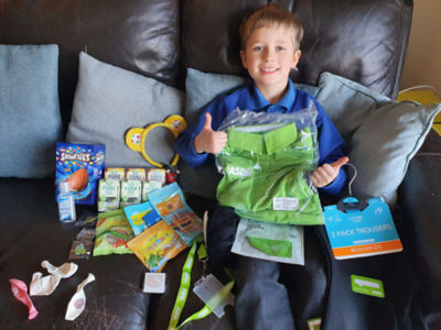 Luca Grose dressed in an Asda uniform for his school superhero day