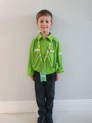 Luca Grose dressed in Asda uniform for his school superhero day