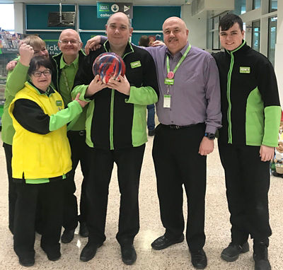 Asda Dundee Kirkton colleague Matthew White celebrating his Special Olympics call up with colleagues