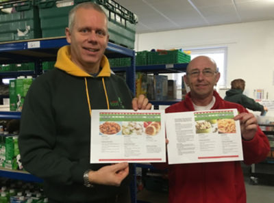Asda Workington community champion Kevin Hunt with Adrian at North Lakes foodbank